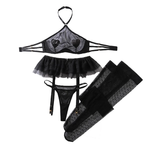 Black mesh lingerie set with halter bra, heart patches, garter belt and polka dot stockings
