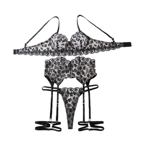 Three-piece leopard lace lingerie set with underwire bra, garter belt, and thong panty