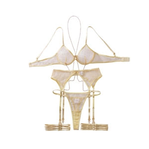 Pale yellow lace lingerie set with metal chains including bra and garter straps