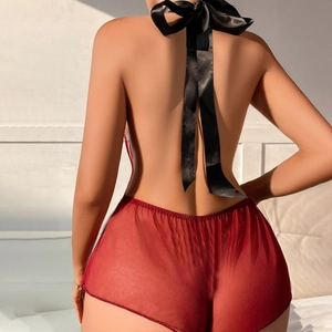 Sexy backless sheer mesh bodysuit in red with a large black satin bow detail on the neck