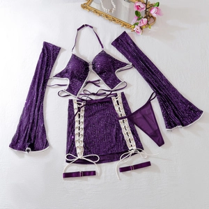 Sparkly purple sequin lingerie set with halter neck top and side-tie mini skirt
