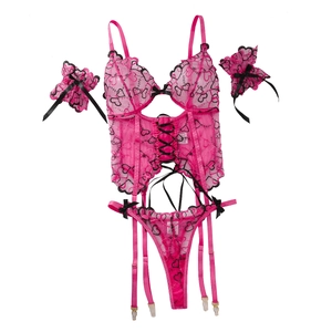 Pink lace lingerie set with black heart embroidery, corset and g-string pieces