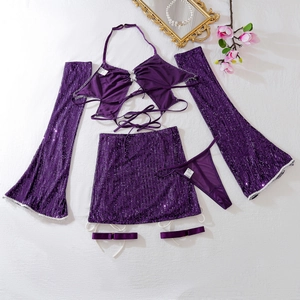 Detail of sequined purple four-piece lingerie set with halter top and skirt