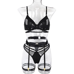 Three-piece black lace mesh lingerie set with underwire bra, garter belt and thong