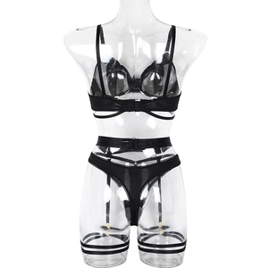 Detail view of black mesh lace lingerie set with underwired bra and garter belt