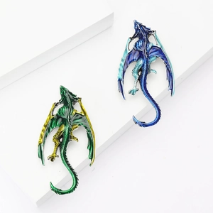 Exquisite Western dragon brooches with green and blue enamel on white stairs