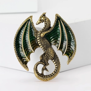 Luxury western dragon brooch in vintage gold finish with deep green enamel details