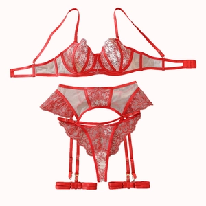 Three-piece red lace lingerie set with underwire bra, garter belt and matching thong