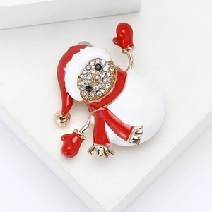 Broche de muñeco de nieve navideño en esmalte con gorro rojo y cristales brillantes