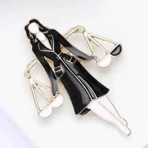 Creative lawyer brooch for women with black coat and golden scales design on white background