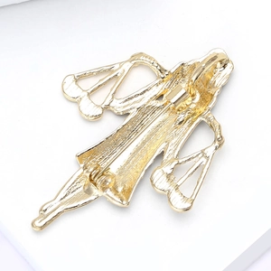 Close-up of the back of gold-plated lawyer scales angel brooch with safety pin clasp
