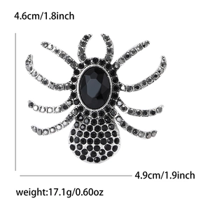 Vintage silver spider brooch with black rhinestones and oval gemstone, size 4.6x4.9cm