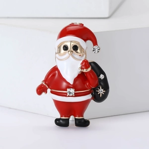 Elegante broche de Papá Noel en esmalte con bordes dorados y brillantes piedras de circón