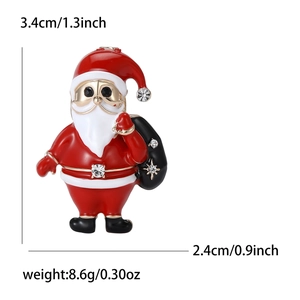 Broche Papá Noel de esmalte rojo y pedrería incluyendo dimensiones de tamaño detalle