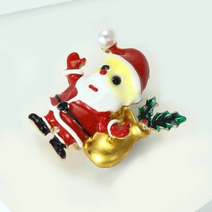 Broche Père Noël 3D en émail avec costume rouge, sac doré et perle sur le chapeau