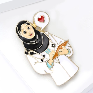 Cartoon doctor enamel brooch for medical staff featuring a hijab and white coat on white