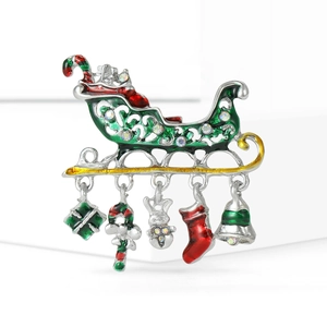 Festive Christmas sleigh brooch with colorful enamel charms and sparkling rhinestones