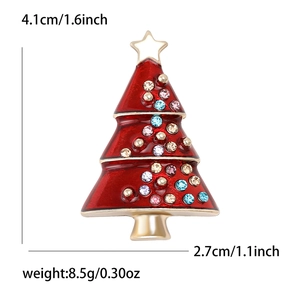 Enamel Christmas tree brooch with colorful rhinestones and gold star on white background