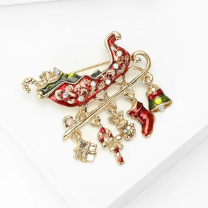 Detailed Christmas sleigh brooch with enamel charms and sparkling white rhinestones
