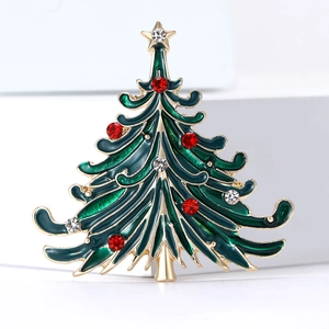 Green enamel Christmas tree brooch with sparkling rhinestones and golden star finish