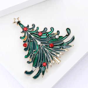 Green enamel Christmas tree brooch with sparkling red rhinestones in gold plating