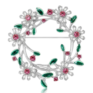 Funkelnde Kristallblumen-Kranzbrosche mit rosa Strasssteinen und grünen Blättern auf Silber