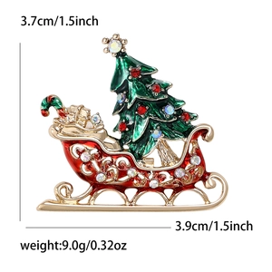 Festive Christmas sleigh brooch in red enamel and gold alloy with colorful rhinestones