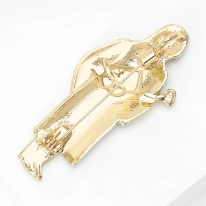 Back view of gold lawyer character brooch with a secure metal pin clasp and alloy texture