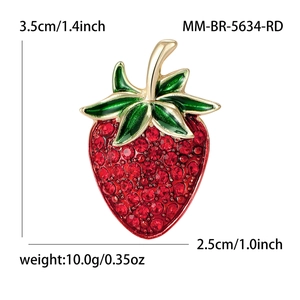 Creative strawberry brooch with red rhinestones and green enamel on a gold-plated base