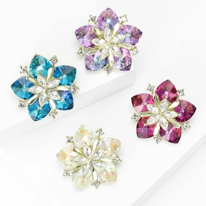 Exquisite crystal sunflower brooches in four colors on elegant white pedestals
