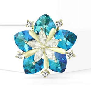 Elegant crystal sunflower brooch with blue heart-shaped gems and gold metal base