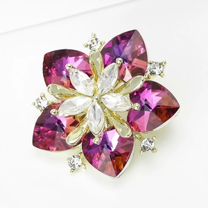Detailed macro view of purple heart-shaped crystal petals on a gold sunflower brooch pin