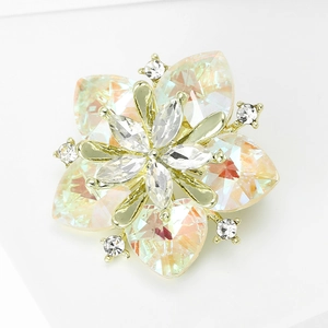 Detailed macro view of sunflower crystal brooch with golden heart petals and zircon core