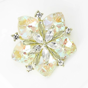 Detailed close-up of a sunflower brooch with colorful crystal petals and a gold base