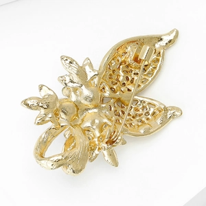 Élégante broche nœud dorée avec pétales évidés et strass brillants pour femmes