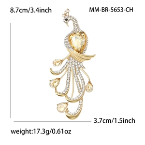 Luxurious gold peacock brooch with sparkling champagne crystals and rhinestones for women