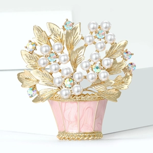 Elegant gold flower basket brooch with white pearls and pink enamel floral design