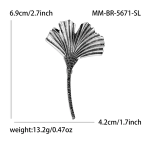 Elegant silver ginkgo leaf brooch with retro brushed metal texture and black crystals