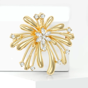 Broche feu d'artifice dorée avec cristaux étincelants pour costumes et gilets de femme