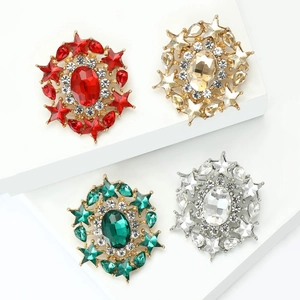 Star-shaped luxury crystal brooch set in four colors with sparkling diamond accents
