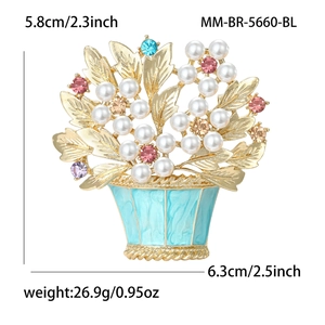 Elegant flower basket brooch with pearls and colorful rhinestones on a gold alloy base
