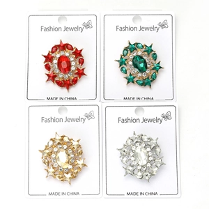 Detailed grid view of elegant alloy brooches with oval gems and star-shaped accents