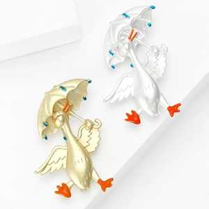 Spille a forma di anatra in lega opaca con ombrelli in smalto blu in oro e argento