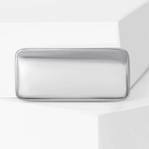Detailed macro view of the liquid metal rectangular brooch showing smooth silver-tone finish