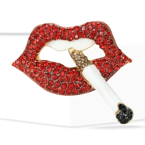 Creative red lips with cigarette brooch featuring sparkling rhinestones and enamel details