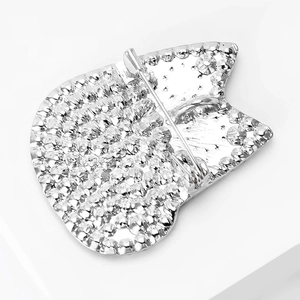 Detail view of silver cat brooch reverse side showing the pin fastener and textured metal finish