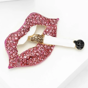Detail of creative enamel lip and cigarette brooch with pink rhinestones for outfits