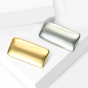 Minimalist gold and silver alloy geometric brooches with a polished mirror finish surface
