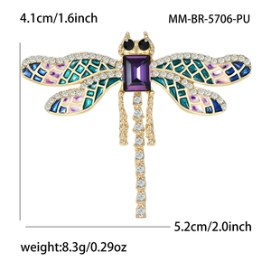 Spilla elegante a forma di libellula in oro con cristallo viola e ali smaltate