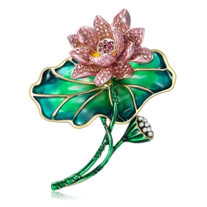 Elegant lotus flower brooch with pink crystals, green enamel leaf, and small pearls